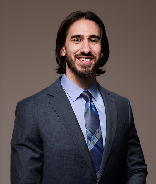 Headshot of Freddie DeYong