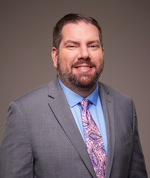 Headshot of Patrick Holmes