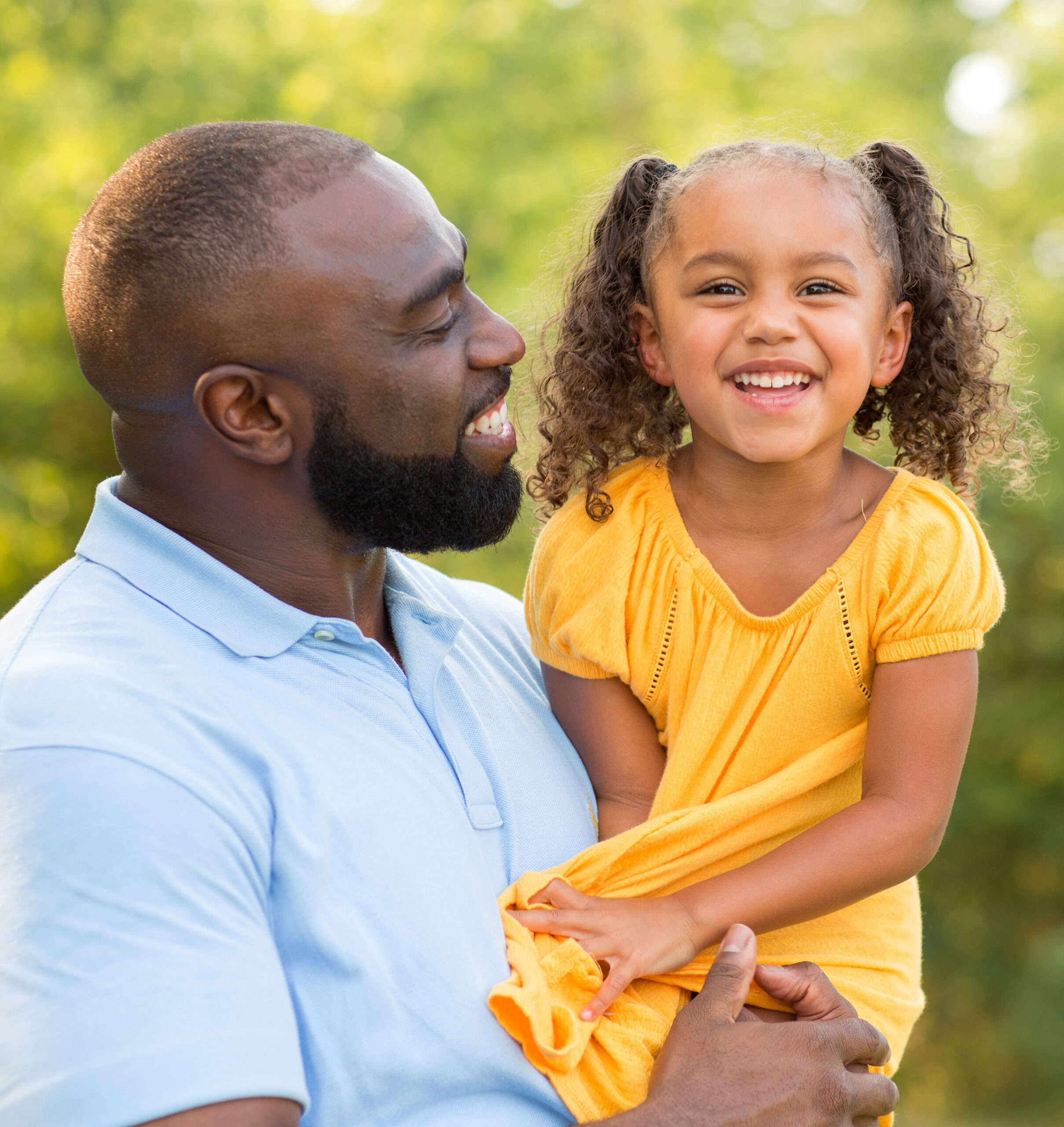 A man holds a child