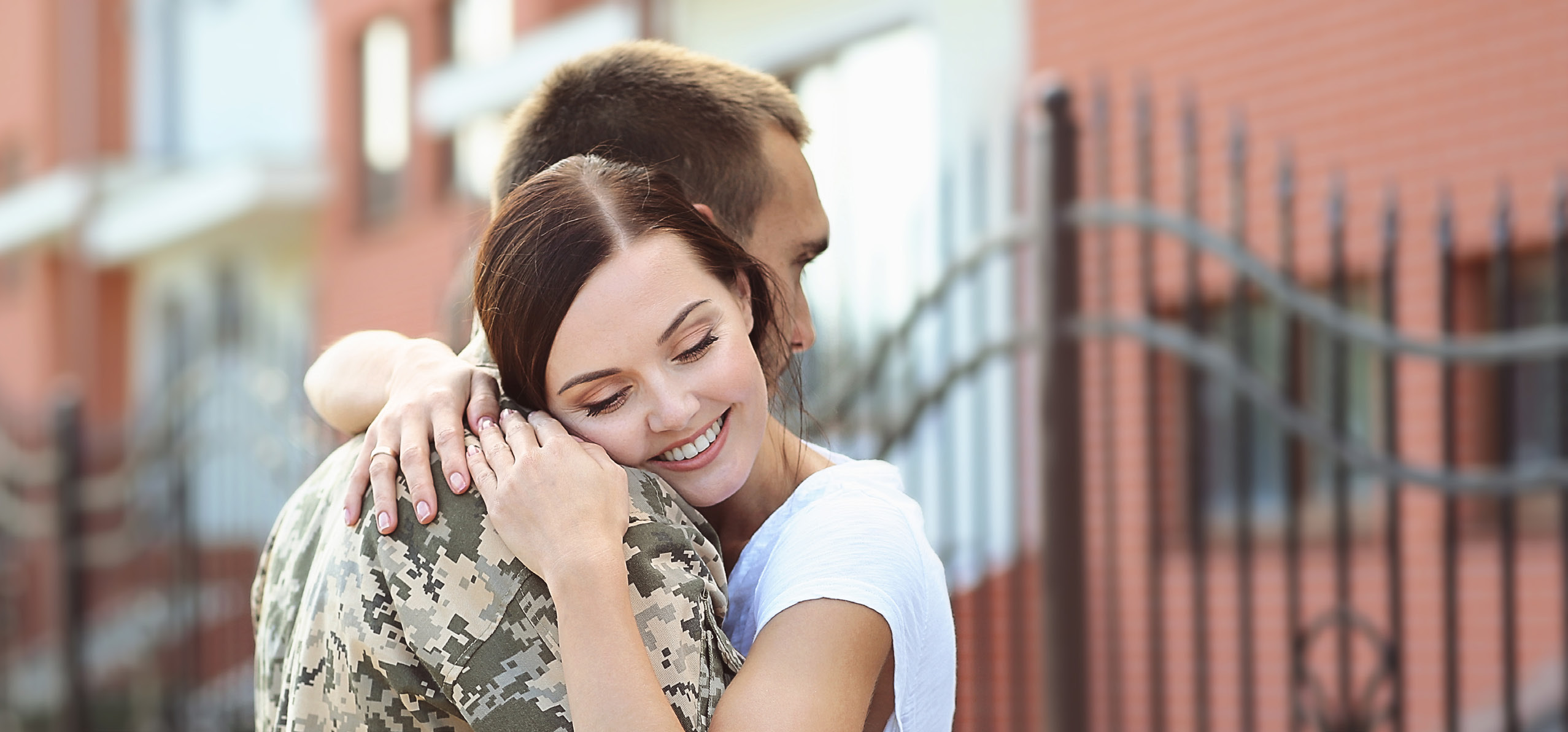 A man and woman embrace