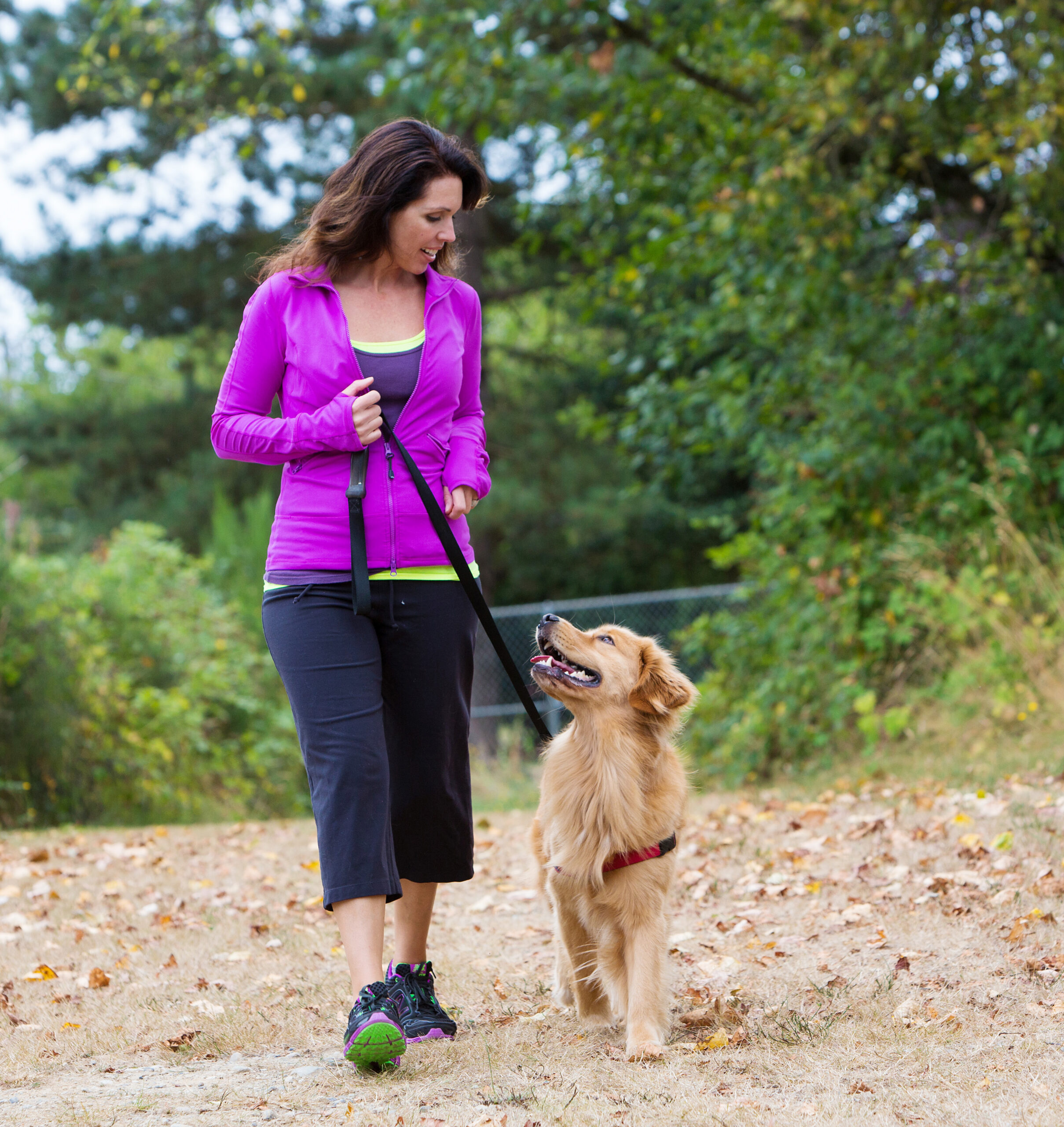A woman walking her dog